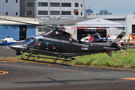 Tokyo, Japan - August 11, 2021:Tokyo Metropolitan Police Department Leonardo AW109 Trekker (JA36MP) utility helicopter.