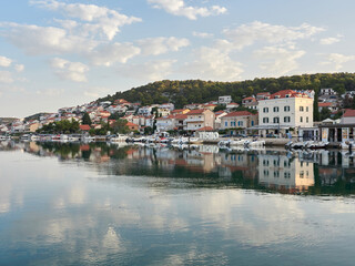 Tisno, Croatia - City landscape in the morning overlooking the marina with boats. Murter Island.