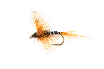 Macro shot colorful fishing fly isolated on a white background. Hand made fly fishing flies. Fluffy...