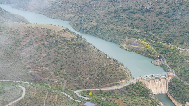 Mountain and Douro river with spanish Saucelle Dam. Border between Portugal and Spain. National Parks. View from portuguese Penedo Durao lookout.