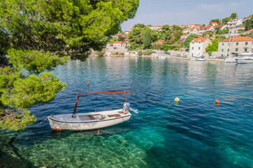 Fototapeta na wymiar Picturesque bay in Splitska village. Splitska is situated on the north coast of Brac island in Croatia.