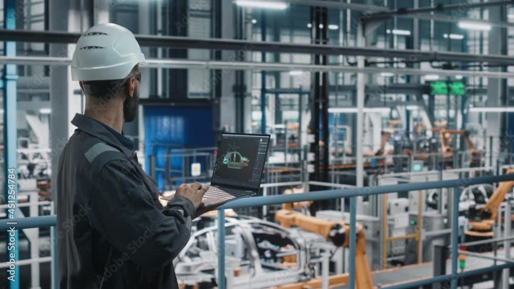 Aufkleber Car Factory Engineer in Work Uniform Using Laptop Computer with Digital 3D CAD Vehicle Blueprint. Male Specialist in Automotive Industrial Manufacturing Facility Working on Automobile Production.