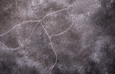 Dark abstract concrete crackle background