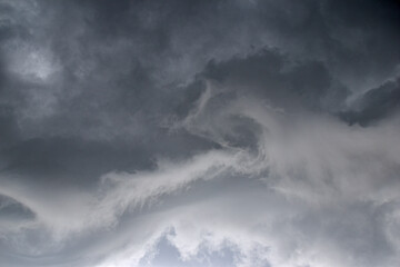 Storm hurricane blue leaden torn clouds on the horizon