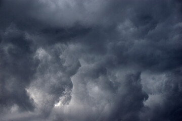 Storm hurricane blue leaden torn clouds on the horizon