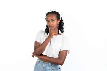 Beautiful woman thinking with her hand in the chin. White background. African-Ethiopian black woman. Thoughtful concept.