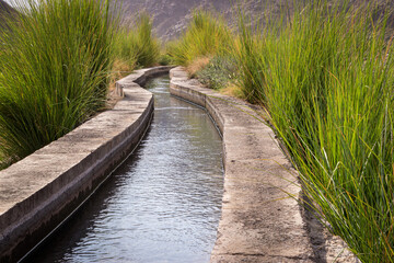 The traditional falaj irrigation system in the mountain village of Al Hoqain in Oman