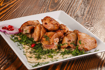 Grilled chicken barbecue served herbs