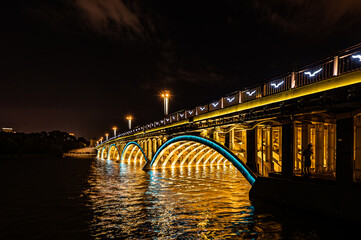 Fototapeta premium Night view of Nanhu Bridge in Changchun, China