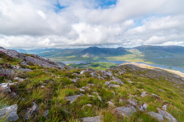 Mountains view over Lough Inagh from top of Derryclare peack.