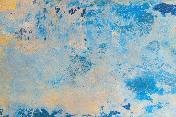Old blue cracked paint the old wall background, Painted concrete wall. Abstract background. Art texture. Colorful modern artwork. Modern art. Contemporary art. Artistic wall paint.