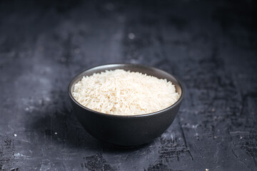 Uncooked rice in bowl 