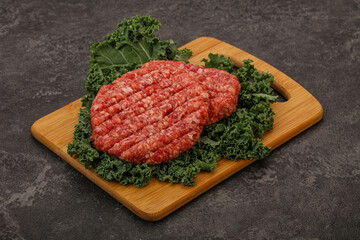 Raw beef burger cutlet for cooking