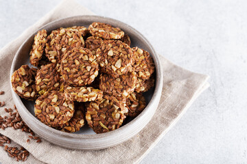 Energy cookies or crispbread (from sesame seeds, flax seeds and other cereals)
