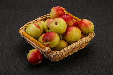 Sweet small nectarines in the basket