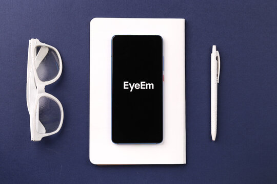 Assam, india - April 19, 2021 : EyeEm logo on phone screen stock image.