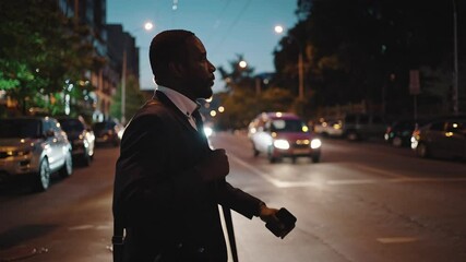 Night lifestyle. Tired african american businessman with bag passing road against cars, going home after working day