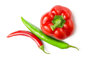 Red and green chili peppers and bell peppers isolated on white background.