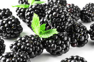handful of fresh tasty blackberries isolated on white background