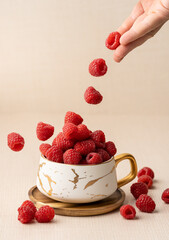 raspberries in a cup