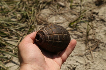 Rare porcelain grenade in hand