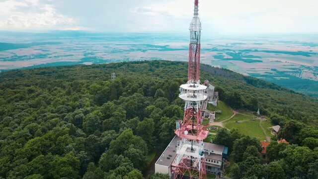 Drone flight over mountain village with forests. Sleza mountain near Wroclaw in Poland. Nature background, aerial view