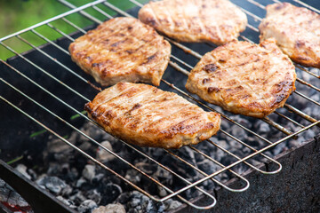 Grilled pork steaks, afternoon close-up.