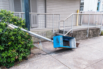 Fallen Phoneless Pay Phone Stand on Sidewalk 