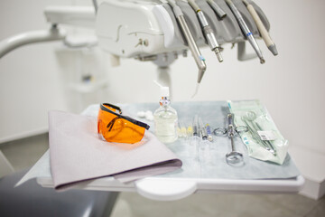 Modern dental clinic cabinet - dentist chair, equipment and tools. Dentistry, medical office