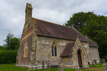 Fototapeta na wymiar St Nicholas church in the hamlet of Huish, on the South facing edge of the Marlborough Downs, adjacent to Pewsey Vale, Wiltshire AONB 