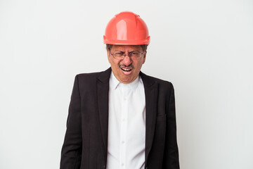 Middle aged indian architect man isolated on white background screaming very angry and aggressive.