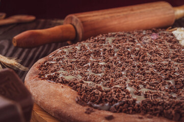 Brazilian sweet pizza with chocolate and condensed milk.