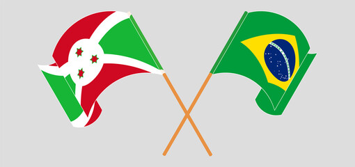 Crossed and waving flags of Burundi and Brazil