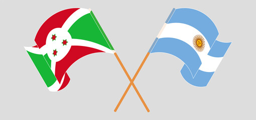 Crossed and waving flags of Burundi and Argentina