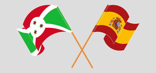 Crossed and waving flags of Burundi and Spain