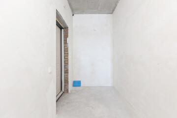 interior of the apartment without decoration in gray colors