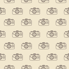 Photo camera seamless pattern. Graphic vector draw illustration with cameras in catroon style.