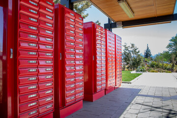 Mail is collected from red, numbered postboxes in a small town in New Zealand