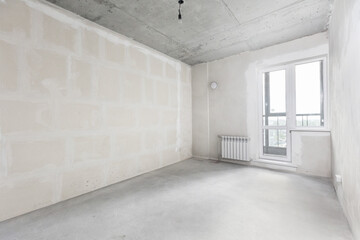 interior of the apartment without decoration in gray colors