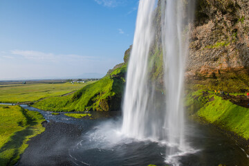Fototapeta premium The beautiful waterfall of Seljalandsfoss in south Iceland on a summer day