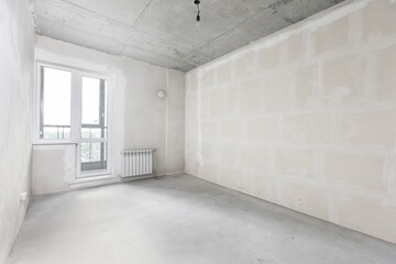 interior of the apartment without decoration in gray colors
