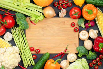 cutting board and many different vegetables for cooking