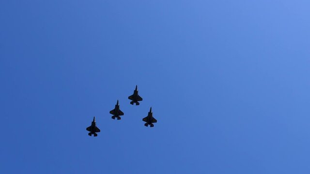 four jets commence a flyover on the 4th of july