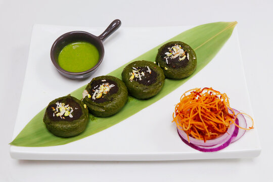 Hara bhara kababs or kebab, healthy vegan and vegetarian indian snack made with potatoes, spinach, green peas, served with mint chutney