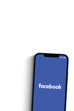 Facebook app on smartphone screen on white background. Social media from the same group as Instagram and Whatsapp. Top view. Rio de Janeiro, RJ, Brazil. June 2021.