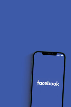 Facebook App On Smartphone Screen On Blue Background. Social Media From The Same Group As Instagram And Whatsapp. Top View. Rio De Janeiro, RJ, Brazil. June 2021.