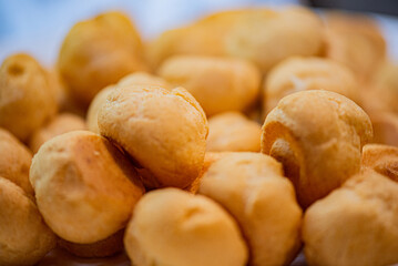 Fresh baked golden bread rolls in bread basket