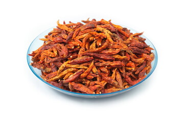 dried chili on plate on white background.