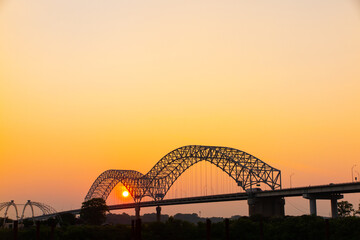 Hernando Desoto Bridge on the Mississippi River at dusk