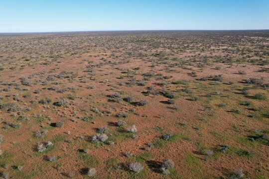 Outback Australia aerial drone photo over the wild rural dry red center desert landscape of Western Australia